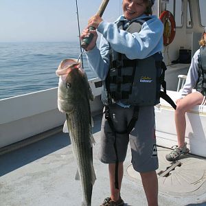 Tom's striper , beat Dad that day by 1/8"