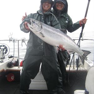 Dad and me 27Lbs west side of Soquel hole. . in the rain!