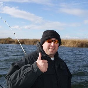 Striper fishing / Good friend Pete, trying for the big one.