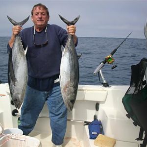 Me with two albacore on my 2301 Striper. We caught a total of 12 albacore twenty to fifty NM west of Noyo Harbor. Aughst 2007.