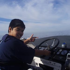Nathan at the wheel of the Ghost Ship