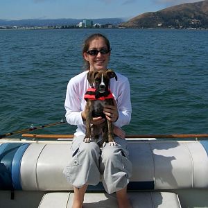 My wife with our pup out on the bay...