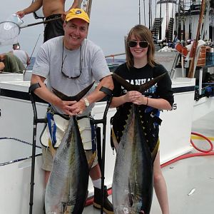 Dad with his 59lber and Jordi with her 76 lb yellowfin tuna
