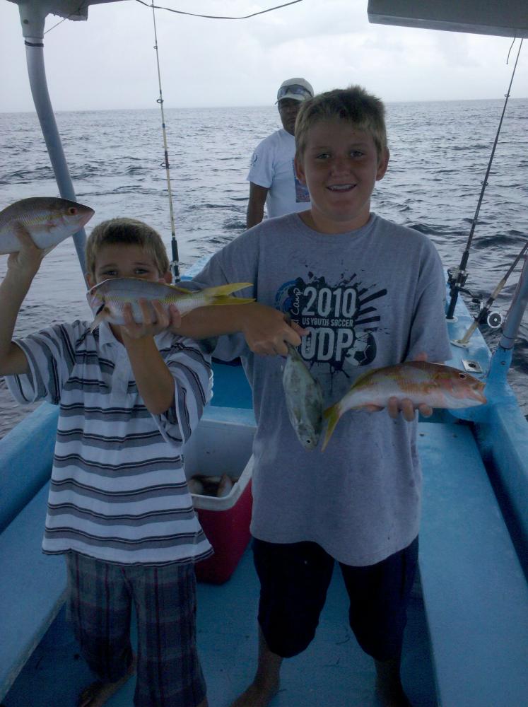 Both kids have caught fish more than they weigh, yet they decide to fish mexican style for yellowtail snapper... HANDLINING.