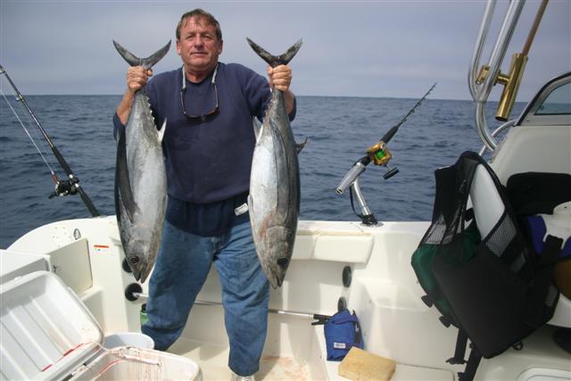 Me with two albacore on my 2301 Striper. We caught a total of 12 albacore twenty to fifty NM west of Noyo Harbor. Aughst 2007.