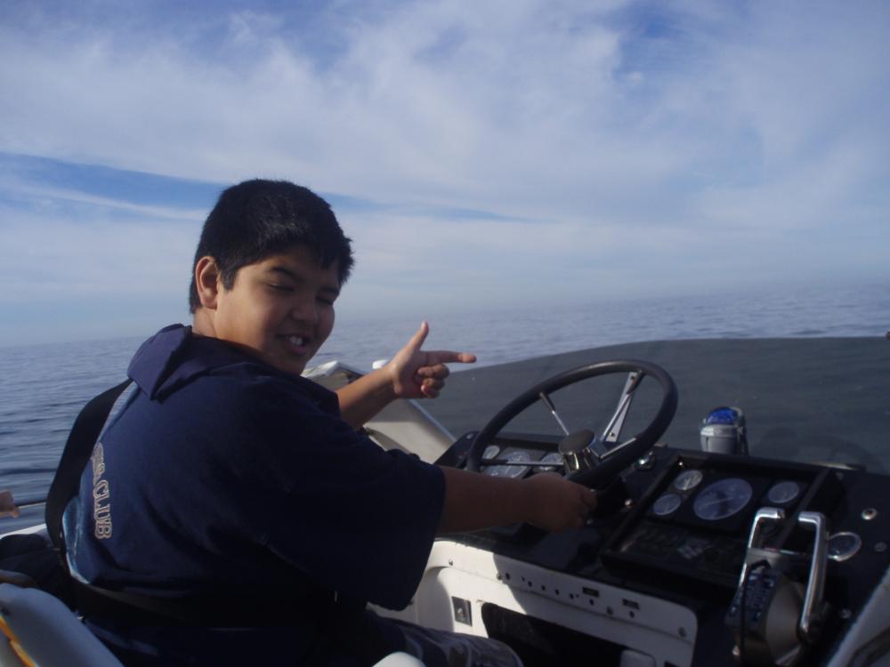 Nathan at the wheel of the Ghost Ship