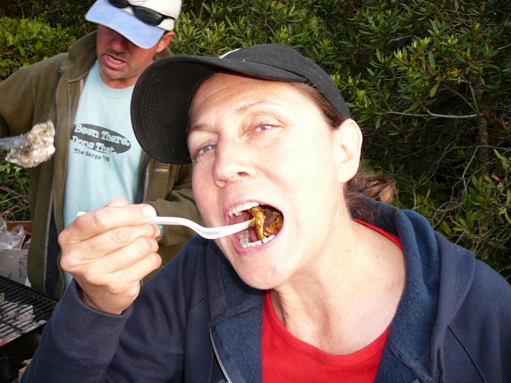 Virginia eating abalone & Todd (liquid asset) getting ready to eat an oyster